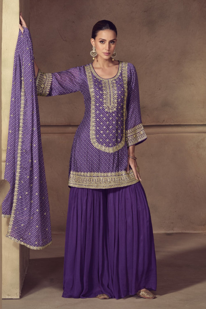 Nimrat orchid full heavy work sharara set